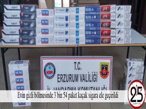 Evin gizli bölmesinde 3 bin 54 paket kaçak sigara ele geçirildi