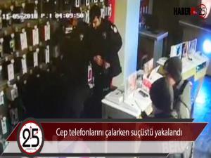 Cep telefonlarını çalarken suçüstü yakalandı